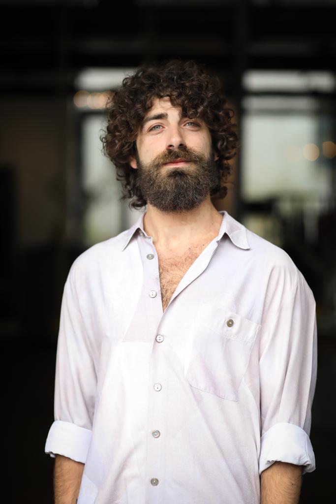 Victor Interthal. Curly. Smiling